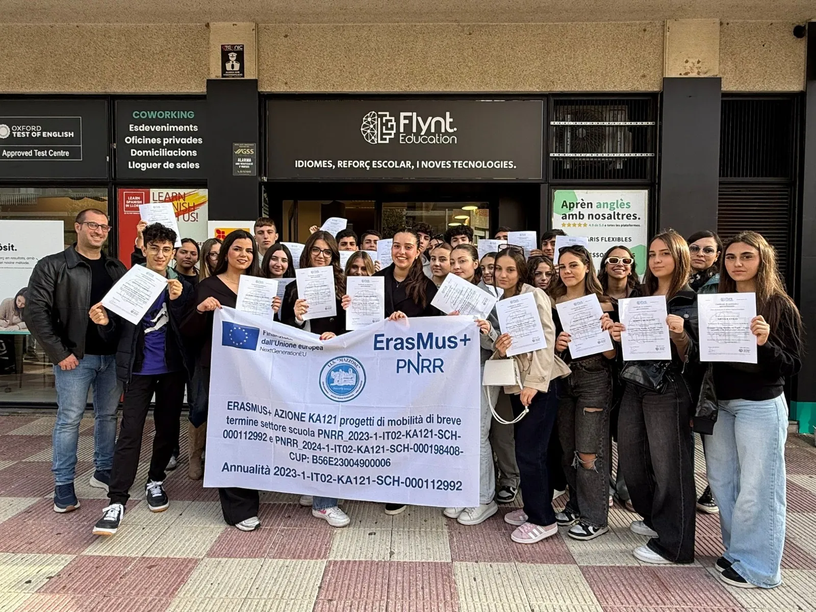 Italian Erasmus+ student group holding programme certificates at Flynt Education